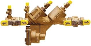 The 1 REDUCED PRESSURE BACKFLOW by Conbraco Inc. is a brass valve with dual Y-shaped connections, yellow handles, and test cocks. Designed for plumbing and fluid control to prevent contamination, it incorporates ball valves for precise regulation, ensuring safety in fire protection systems.