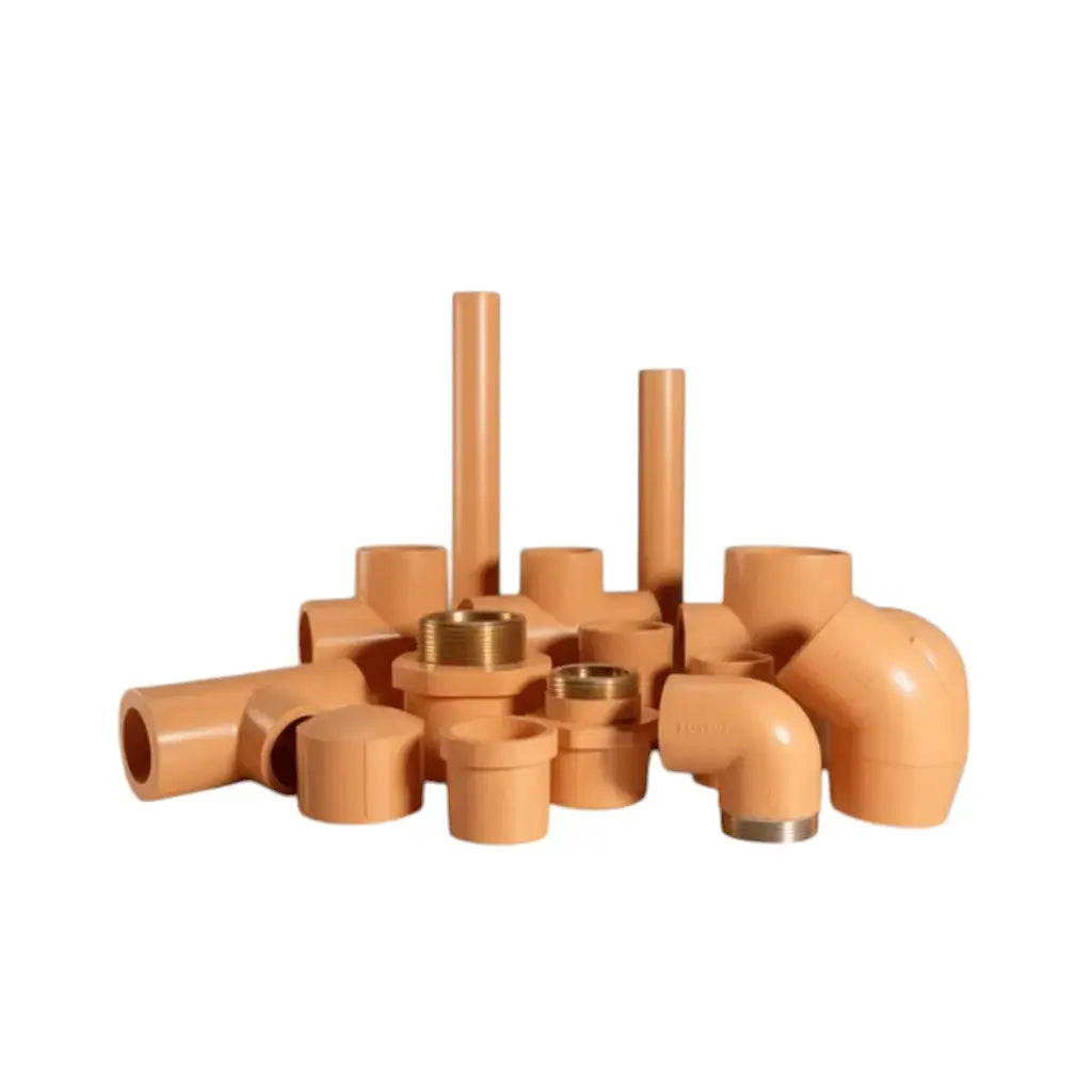 Assorted orange CPVC pipes and fittings including elbows, tees, and connectors arranged on a white background.